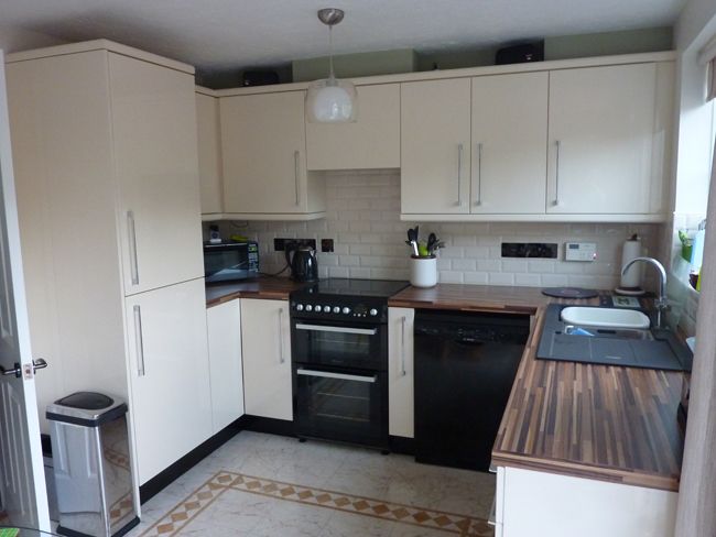 White kitchen with wood sideboards