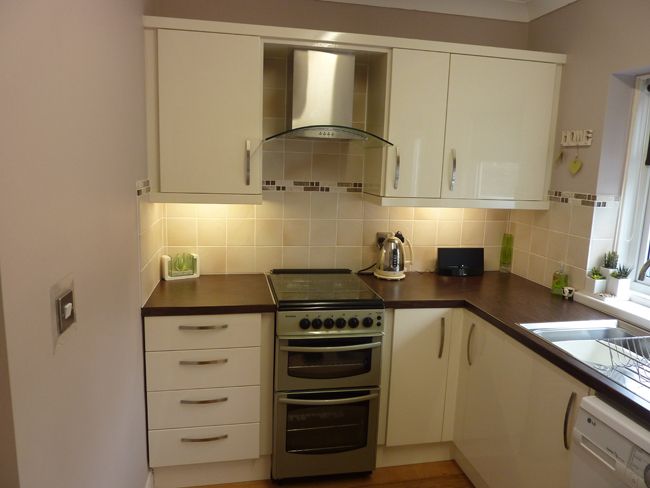 White kitchen furniture and marble sideboards