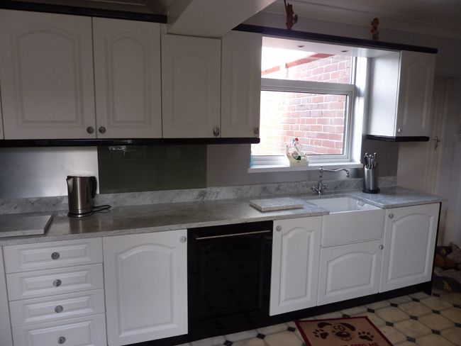 White kitchen furniture and marble sideboards